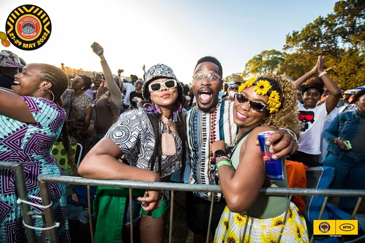 Three friends at the Bushfire festival in Eswatini
